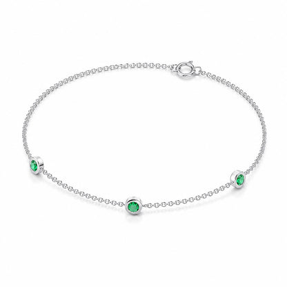 Full view of PT950 natural emerald three-stone bracelet