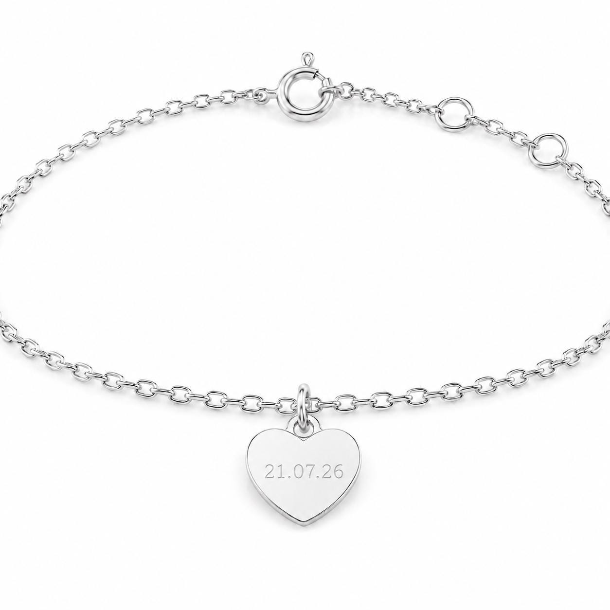 Engraved platinum heart charm bracelet with date