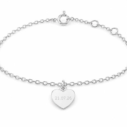Engraved platinum heart charm bracelet with date
