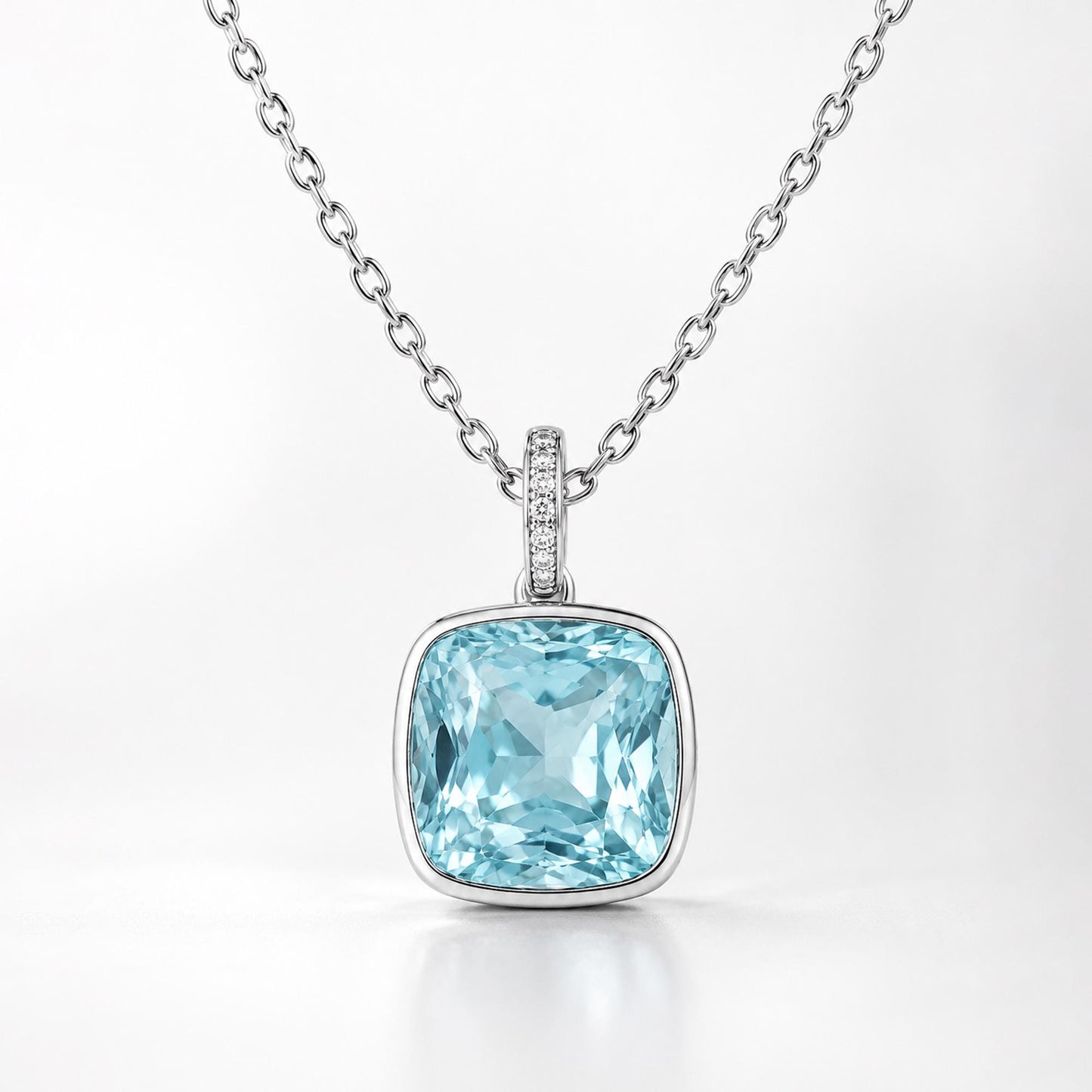 Front view of 4.80ct blue topaz pendant with diamond-set oval bail
