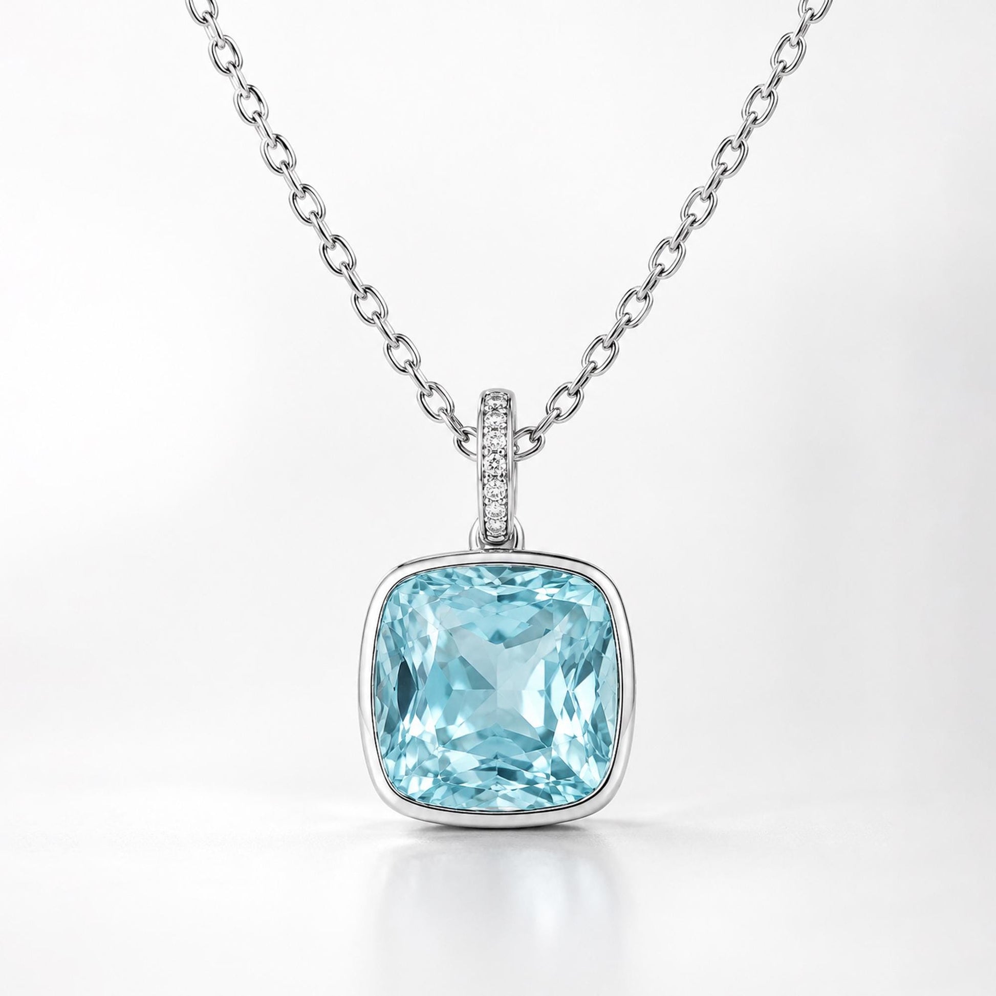 Front view of 4.80ct blue topaz pendant with diamond-set oval bail