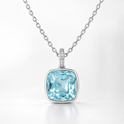 Front view of 4.80ct blue topaz pendant with diamond-set oval bail