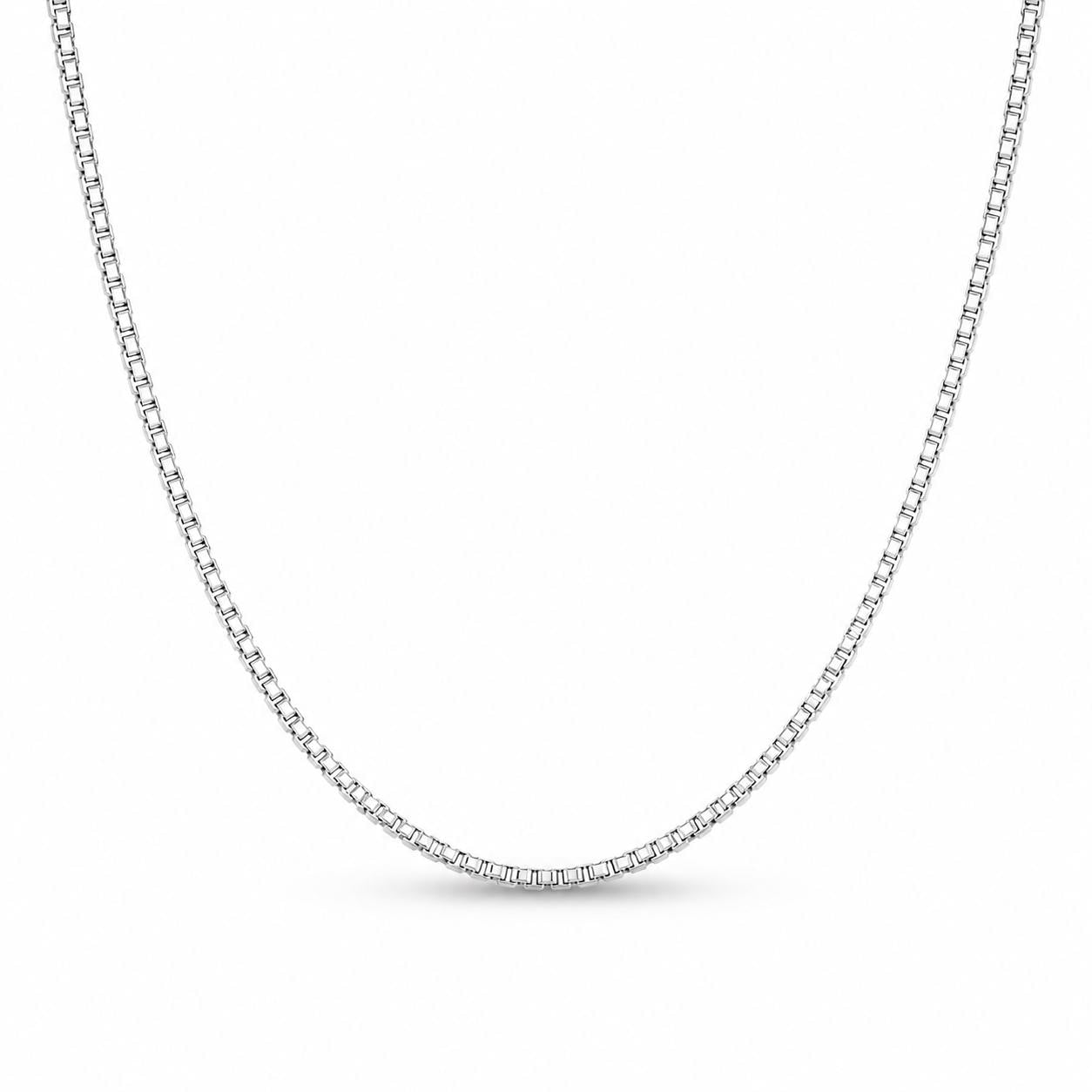 Solid platinum box chain necklace arranged in a soft front drape