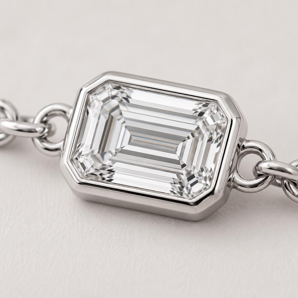 Macro detail of full bezel emerald-cut diamond setting