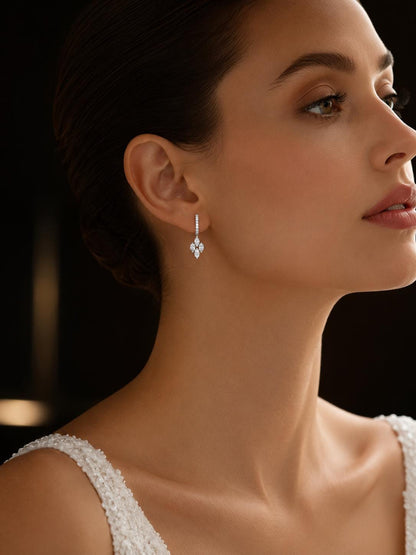 Bride wearing 18K white gold marquise diamond drop earrings