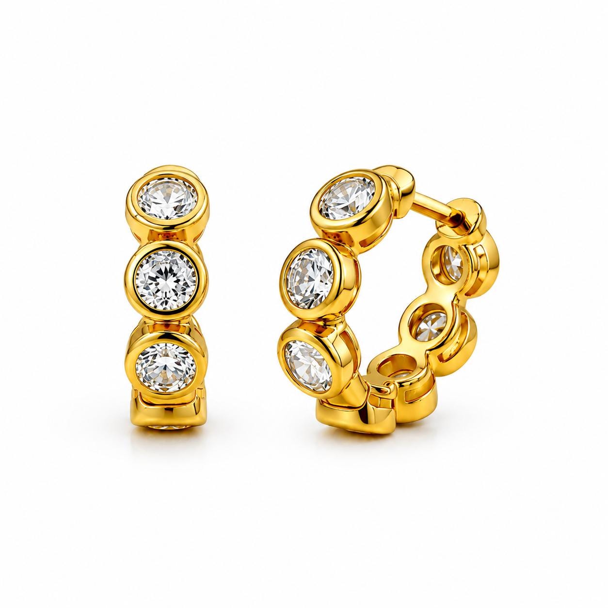 Front and side views of 18K gold lab diamond huggie earrings