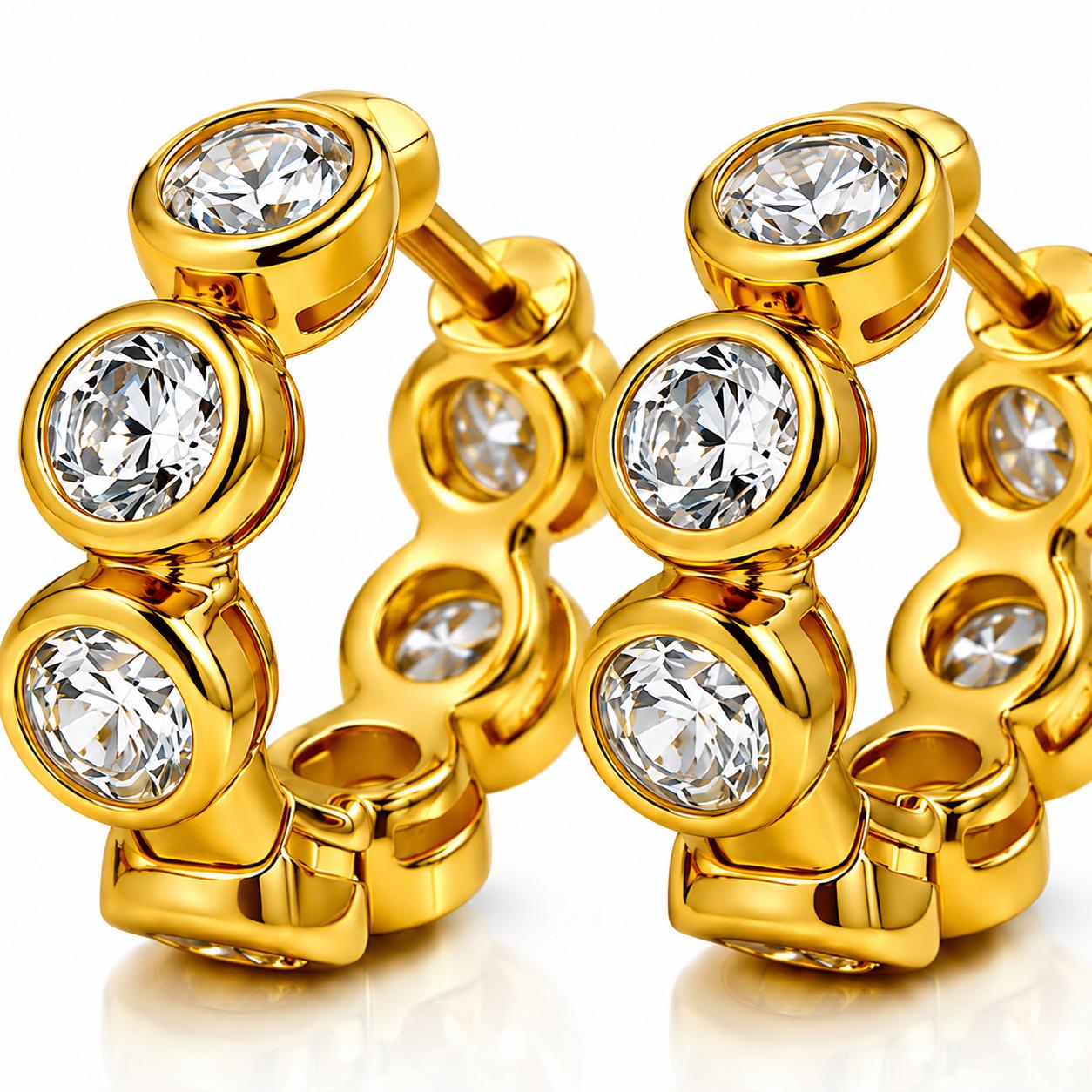 Macro view of bezel-set lab diamonds on 18K gold huggie hoops