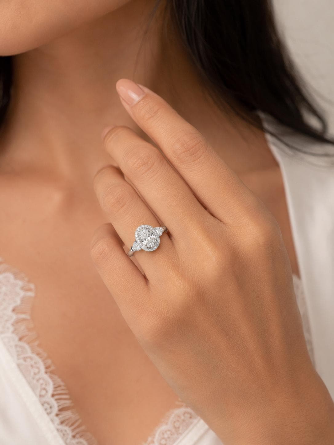 2.75ct oval lab diamond halo ring in PT950 platinum worn view