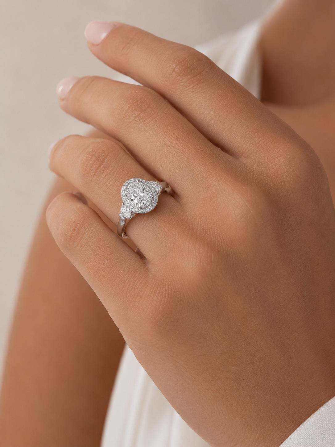 2.75ct oval lab diamond halo ring in PT950 platinum close-up detail