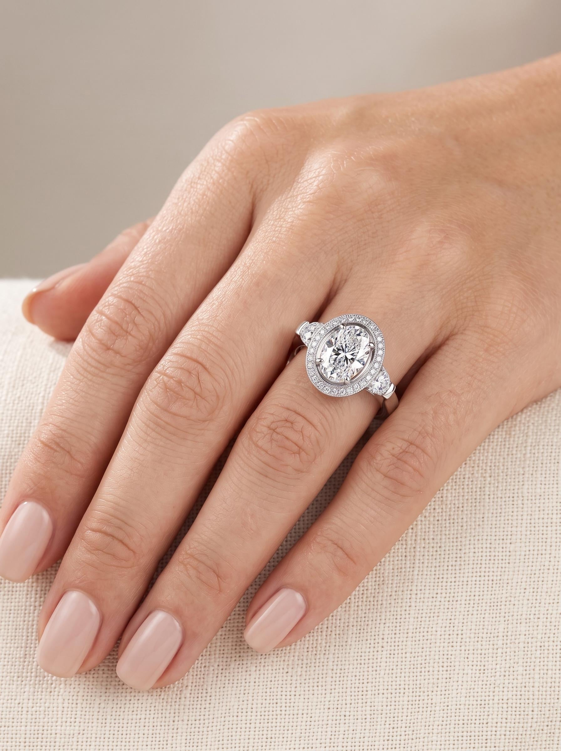 2.75ct oval lab diamond halo ring in PT950 platinum angled view