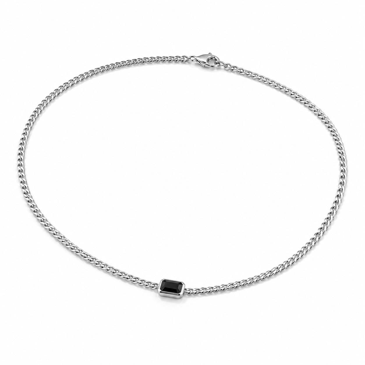 Angled full view of platinum curb chain necklace with black onyx bar