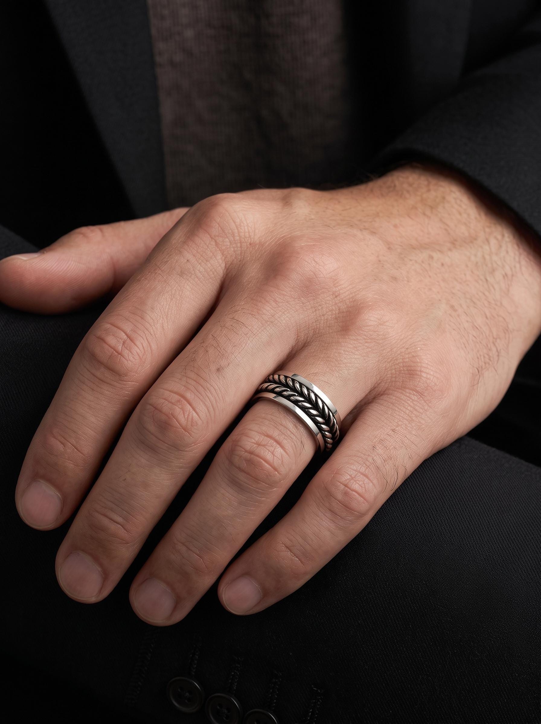 Heavyweight platinum braided leaf ring worn view