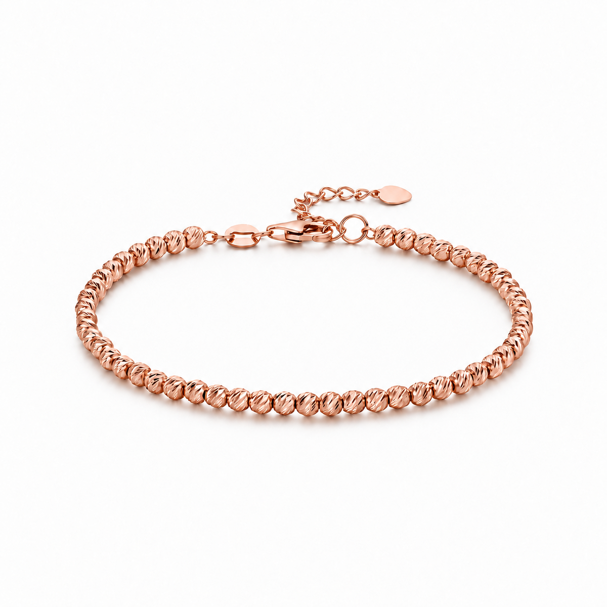 HELIOR Lustre 18K rose gold bracelet with 3mm diamond-cut beads, lobster clasp and extension chain on a white background.