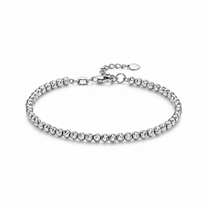 HELIOR Lustre 18K white gold bracelet with 3mm diamond-cut beads, lobster clasp and extension chain on a white background.