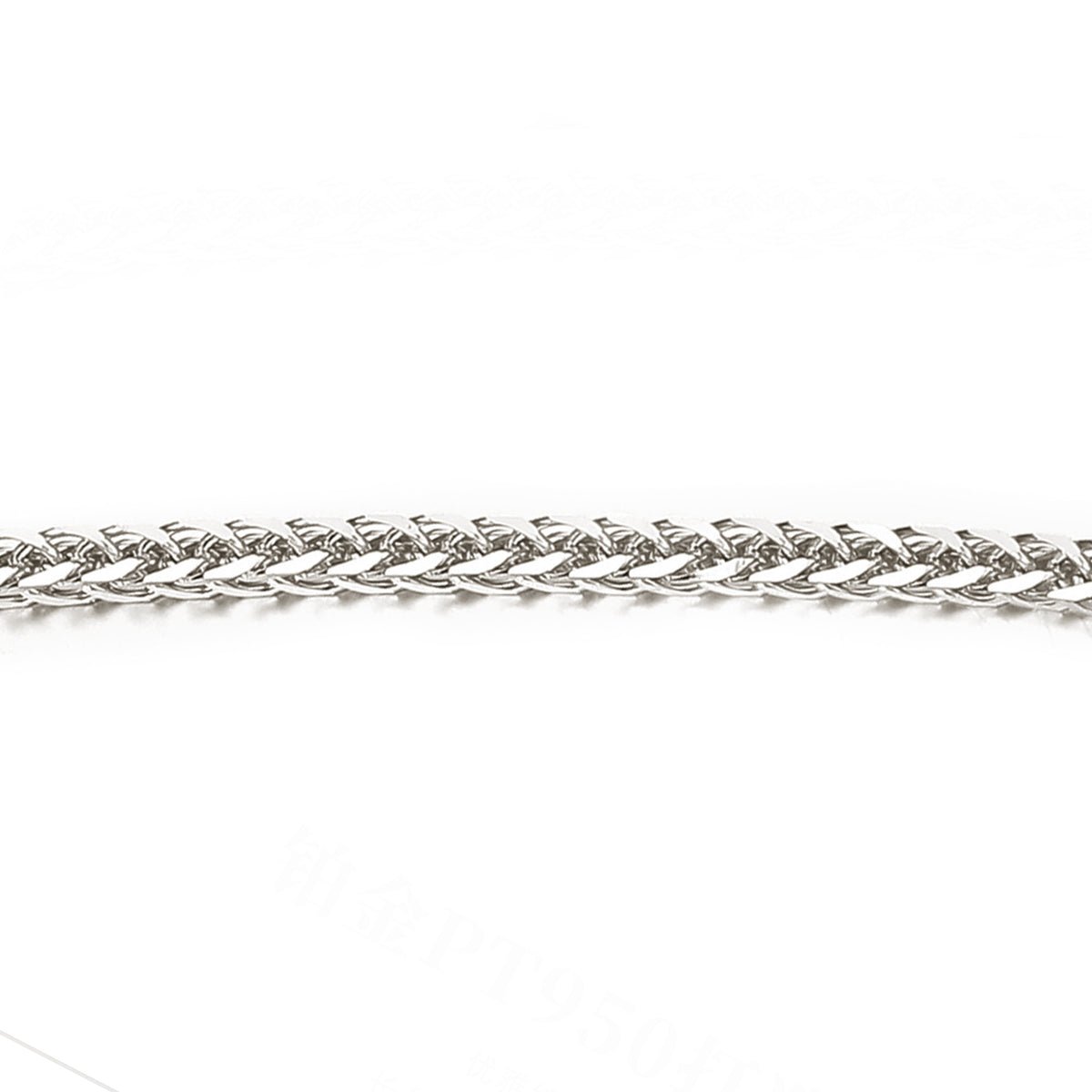 A close-up of a platinum wheat chain necklace against a plain white background.