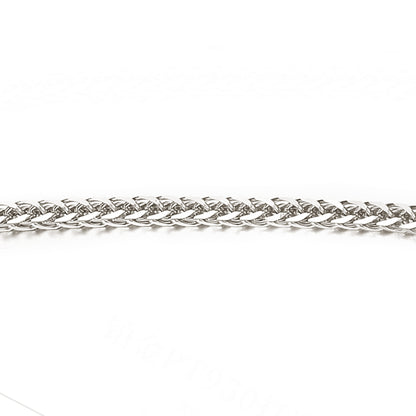 A close-up of a platinum wheat chain necklace against a plain white background.